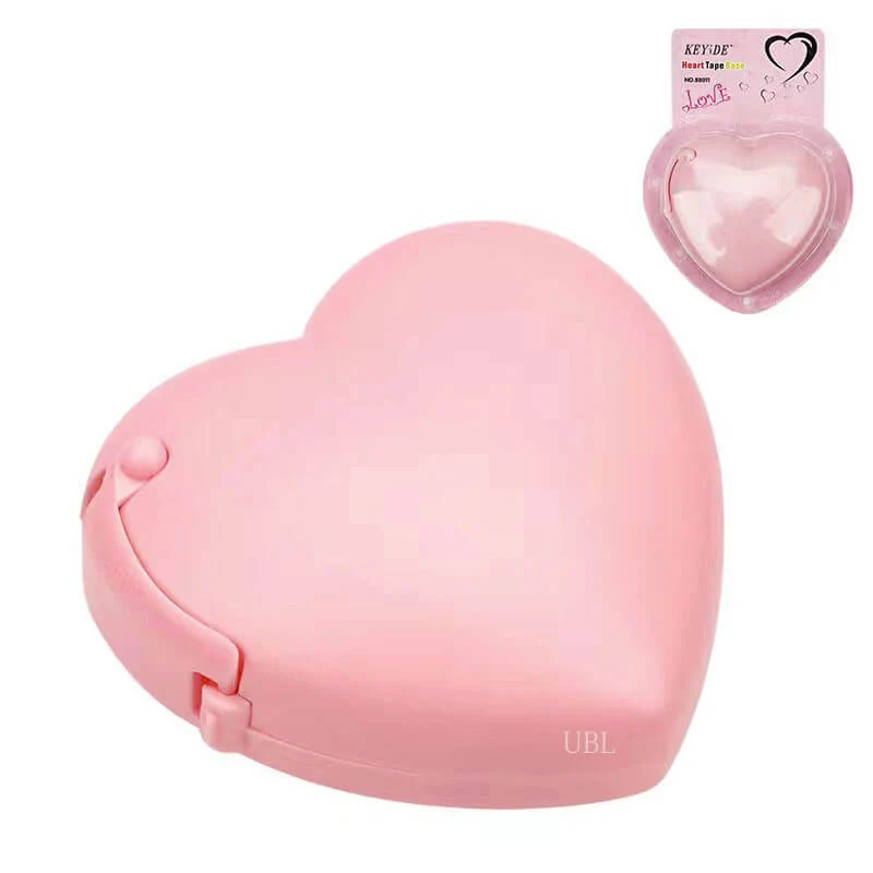 Herzförmiger rosa Klebebandschneider