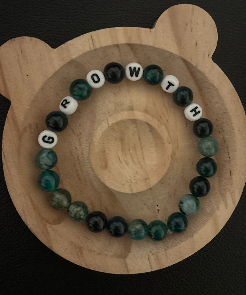 Bracelet with the word growth
