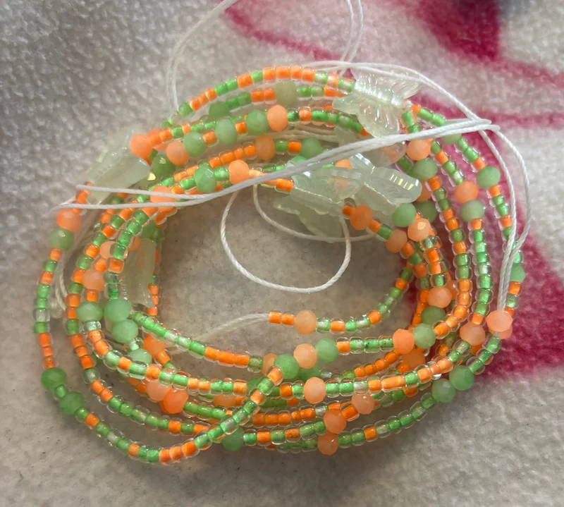 50 inch long waist bead with glow in the dark butterflies