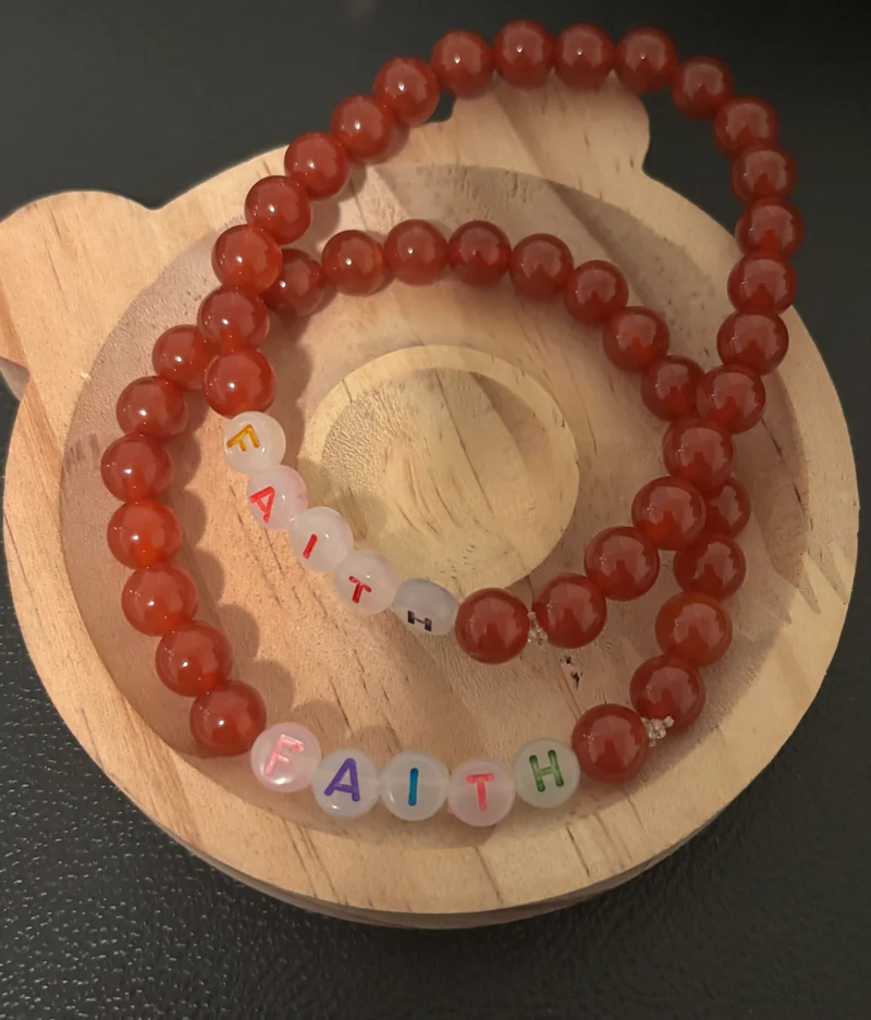Gemstone bracelet with the word faith