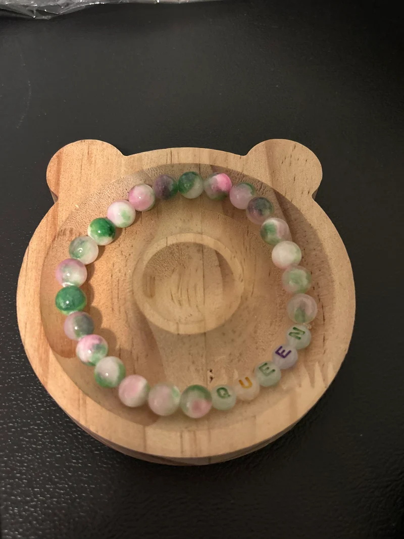 Gemstone bracelet with the word queen