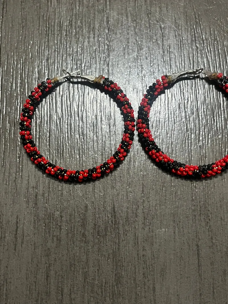 Large red and black hoop earrings